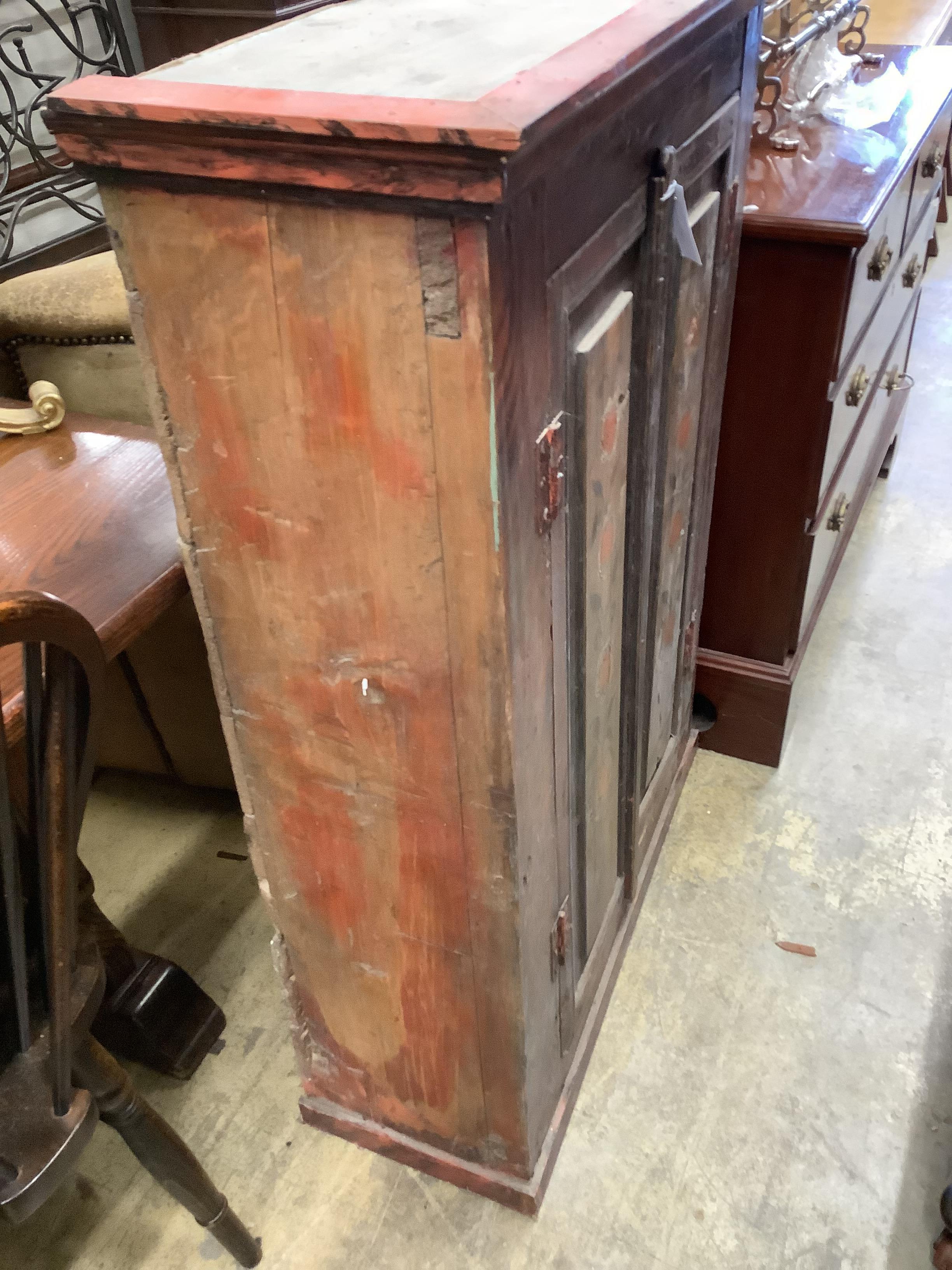 A 19th century Russian painted two door hanging cupboard, width 82cm, depth 31cm, height 110cm